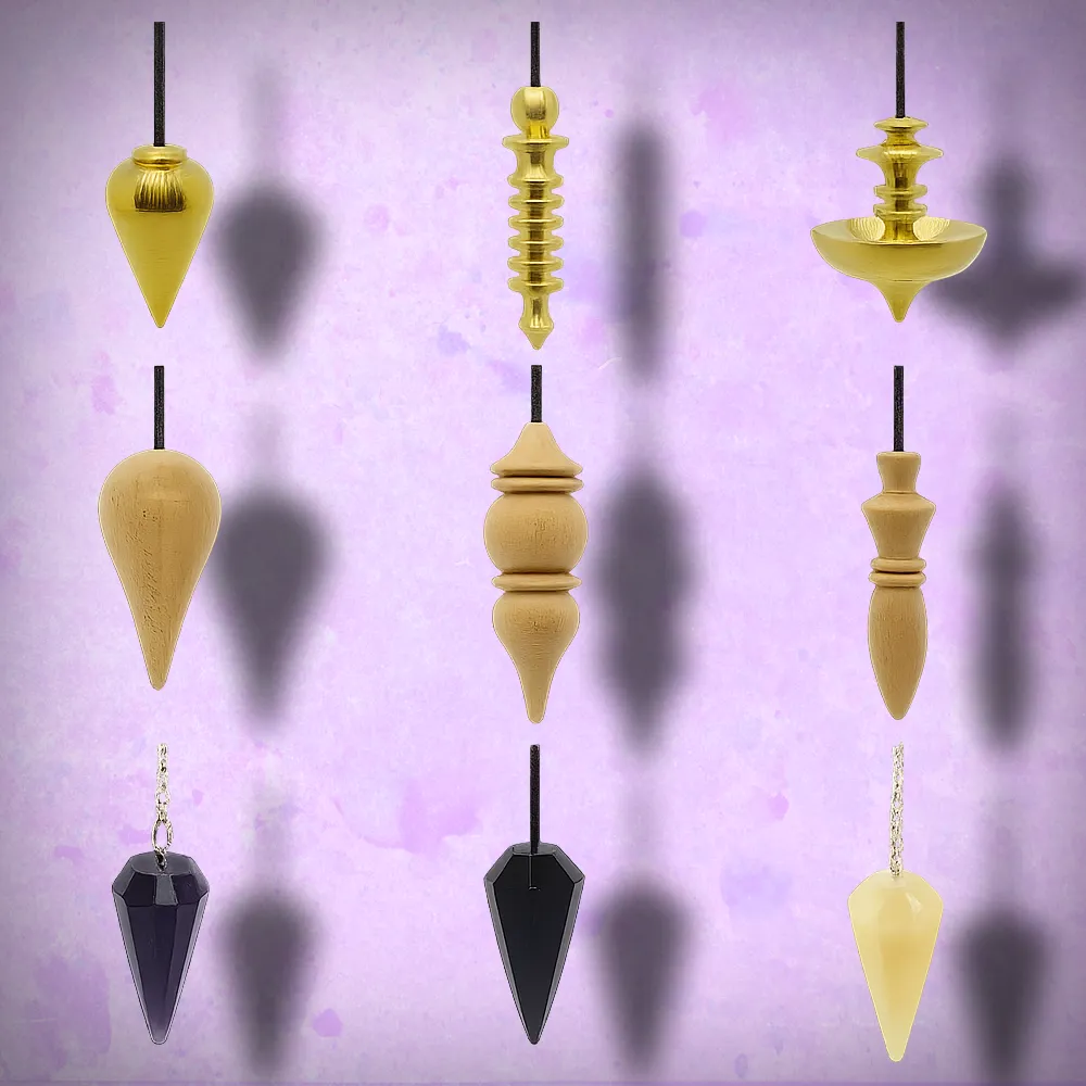 Understanding Pendulums and Dowsing Rods 2 Pendulum Display 1 - Brass, Wood and Crystal pendulums.